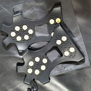 A women's size small pair of ice cleats.